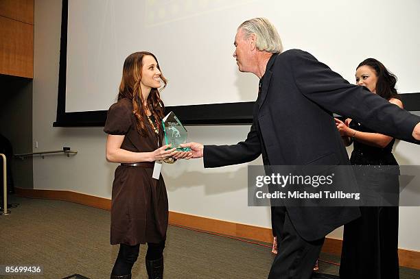 Director Jolie Hales accepts the Best Students Film award for her film "Latter Day Fake" from B.I.F.F. President Val Tonione at the Closing Night...