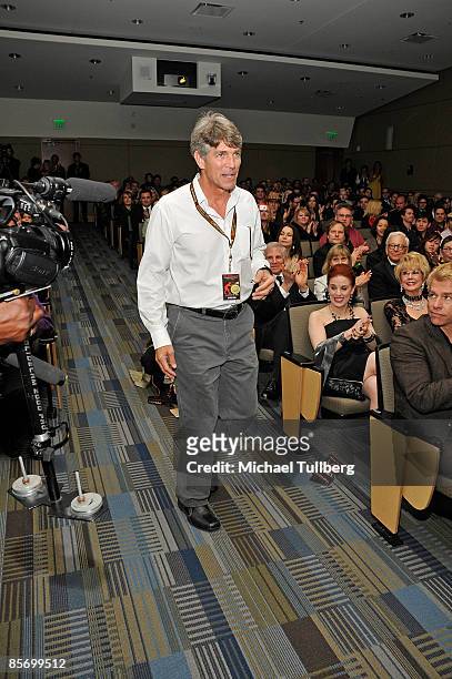 Actor Eric Roberts walks down the aisle to the stage during the awards ceremony at the Closing Night Gala for the 1st Annual Burbank International...