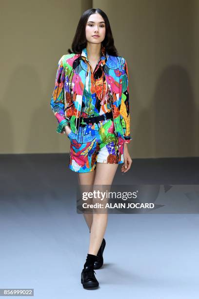 Model presents a creation by Agnes b during the women's 2018 Spring/Summer ready-to-wear collection fashion show in Paris, on October 3, 2017.