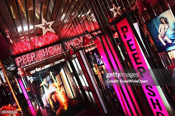 Entrance of a Peep Show Club in the red light district Pigalle and Boulevard de Clichy in the famous quarter Momartre in Paris, France on February...