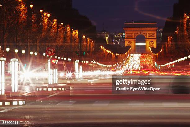 The famous france landmark Arc de Triomphe de L´Etoile in Paris, France on February 25,2009. It was built in 1806 at the behest of Napoleon I. At the...