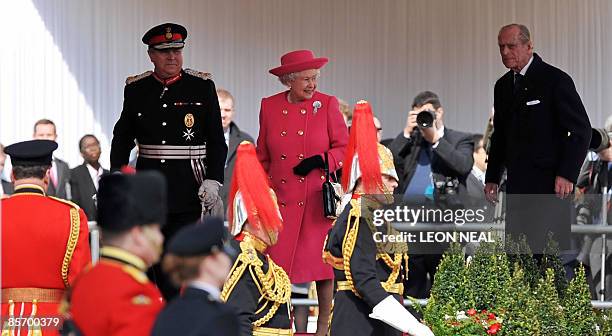 Britain's Queen Elizabeth II arrives at the Royal Dais ahead of the formal welcoming ceremony of Mexican President Felipe Calderon on Horseguards...