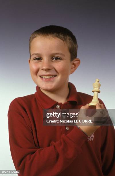 Le jeune champion Etienne Bacrot, espoir poussin, au premier tournoi d'echecs des moins de 15 ans le 6 octobre 1991 a Bois-Colombes, France.