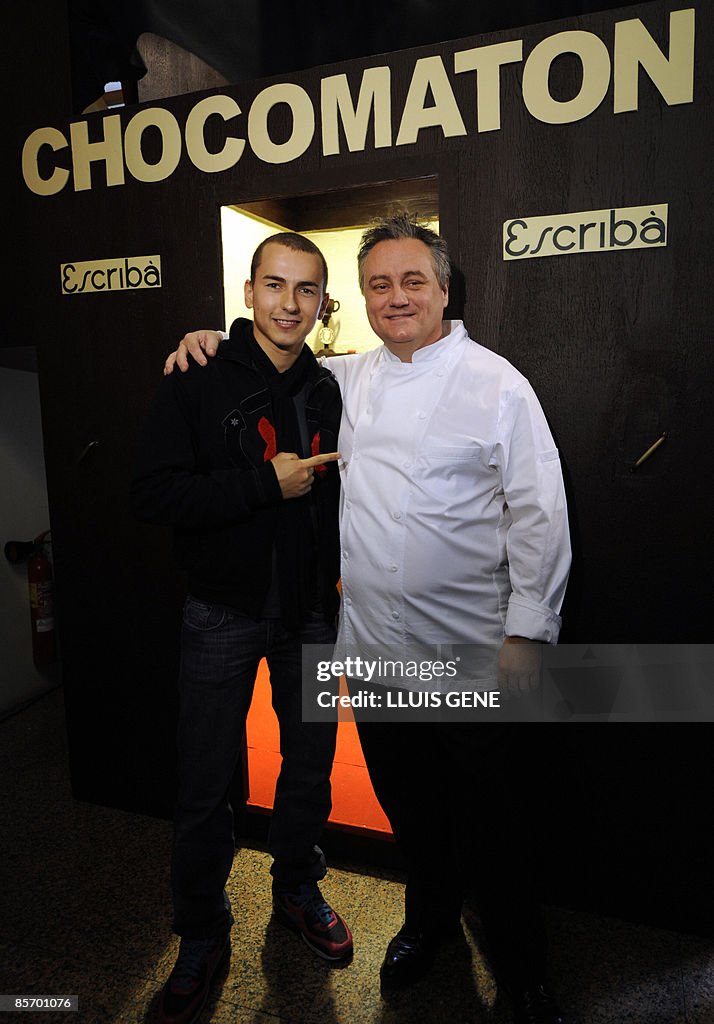 Yamaha Spanish rider Jorge Lorenzo (L) a