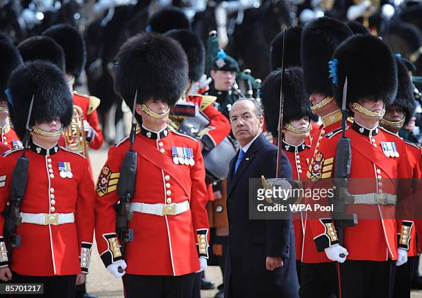The President of Mexico, Felipe Calderon inspects guards on Horse Guards Parade on March 30, 2009 in London. The President of the United Mexican...