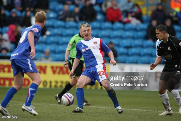 Graham Kavanagh of Carlisle United plays the ball during the Coca Cola League One Match between Carlisle United and Northampton Town at Brunton Park...