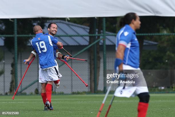 Noharet Dave and Caille Jonathan of France celebrate after scoring a goal during a European Amputee Football Federation European Championship match...