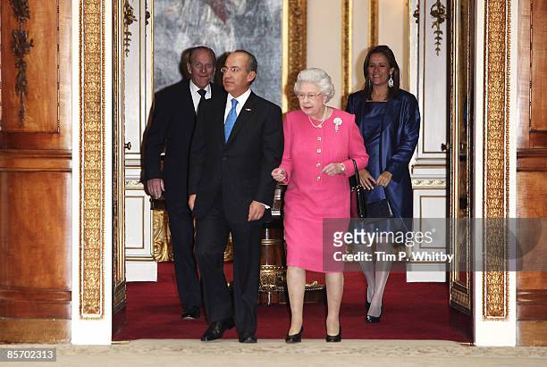 The President of the United Mexican States Felipe Calderon and his wife senora Margarita Zavala accompanied by Queen Elizabeth II and Prince Philip,...