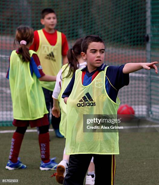 Pupils react during a training session of a school soccer group on one of the DFB Mini Soccer Fields at the Anne Frank school on March 30, 2009 in...
