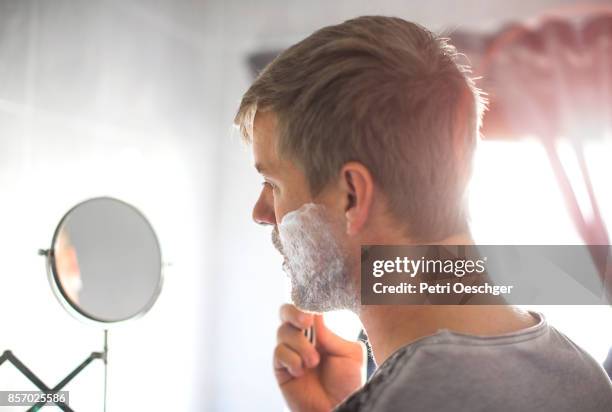 close shave. - shaving cream stock-fotos und bilder