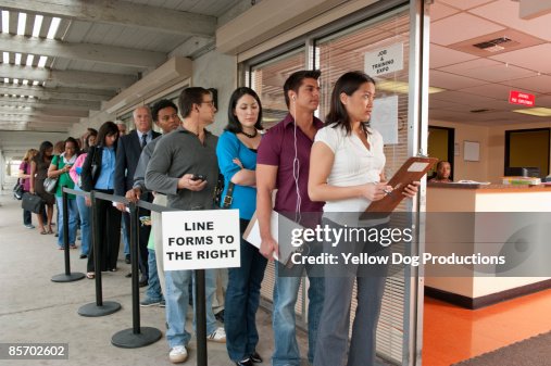 People standing in line at Job and Training Fair People standing in line at Job and Training Fair