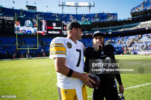 Quarterback Ben Roethlisberger of the Pittsburgh Steelers and free safety Eric Weddle of the Baltimore Ravens talk after a game at M&T Bank Stadium...