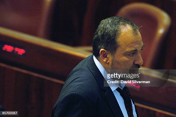 Avigdor Liberman, head of the right-wing Yisrael Beitinu party, walks around during a debate in the Knesset, Israel's parliament, on March 30, 2009...