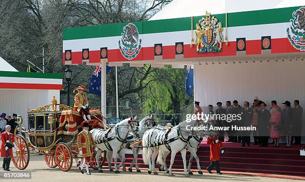 Queen Elizabeth ll meets President Felipe Calderon of Mexico during an official ceremonial welcome at Horse Guards Parade on March 30, 2009 in...