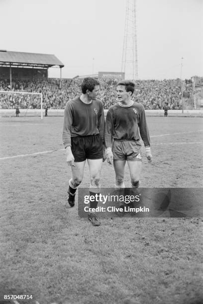 Chelsea vs Newcastle United: brothers John Hollins of Chelsea Fc and Dave Hollins of Newcastle United FC walk together after the game which ended in...