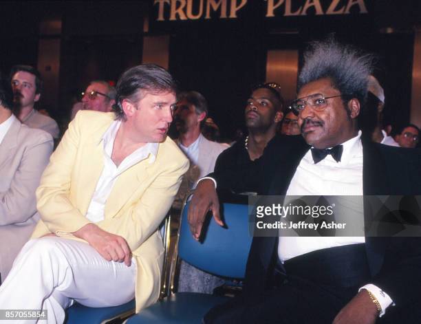 Businessman Donald Trump chatting it up with Promoter Don King at Tyson vs Spinks Convention Hall in Atlantic City, New Jersey June 27 1988.