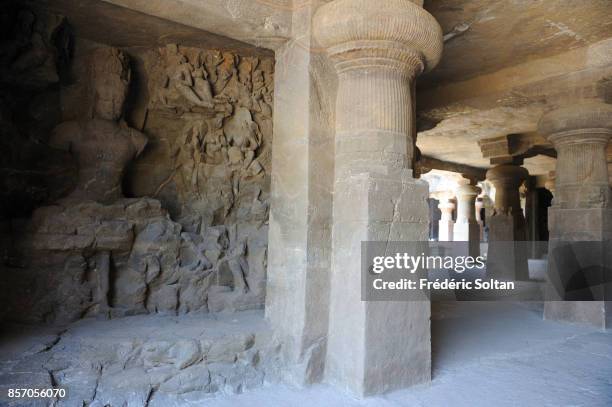 Elephanta Caves. Statue of Hindu deity Shiva, at the Elephanta Caves in Elephanta Island in Mumbai on March 12, 2012 in Mumbai, India.