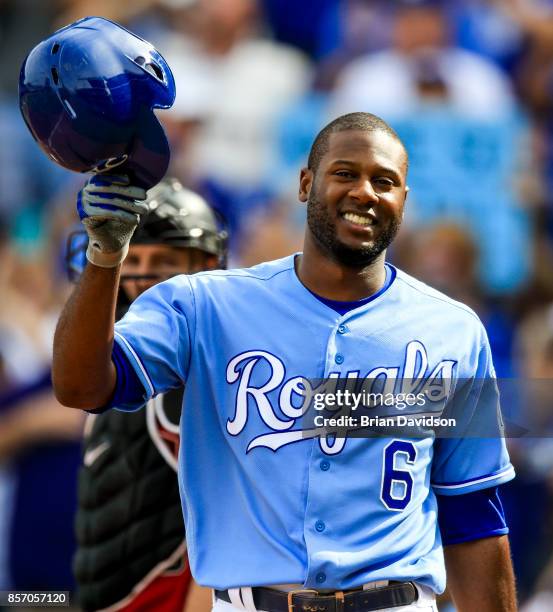 Lorenzo Cain of the Kansas City Royals waves to the crowd during the game against the Arizona Diamondbacks at Kauffman Stadium on October 1, 2017 in...