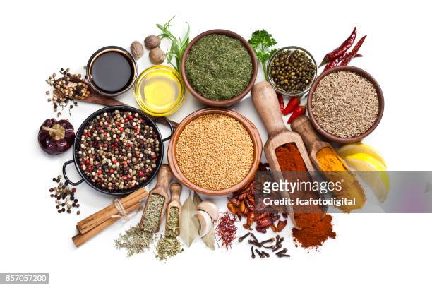 spices and herbs isolated on white background - spice stock pictures, royalty-free photos & images
