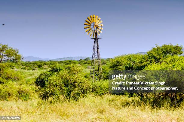 wind mill - gir forest national park stock pictures, royalty-free photos & images