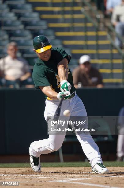 Matt Holliday of the Oakland Athletics at bat during the game against the Milwaukee Brewers at the Phoenix Municpal Stadium in Phoenix, Arizona on...