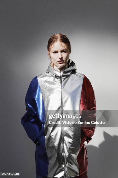 Model poses prior the Moncler Gamme Rouge show as part of the Paris Fashion Week Womenswear Spring/Summer 2018 on October 3, 2017 in Paris, France.