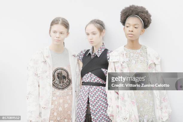 Models pose prior the Moncler Gamme Rouge show as part of the Paris Fashion Week Womenswear Spring/Summer 2018 on October 3, 2017 in Paris, France.