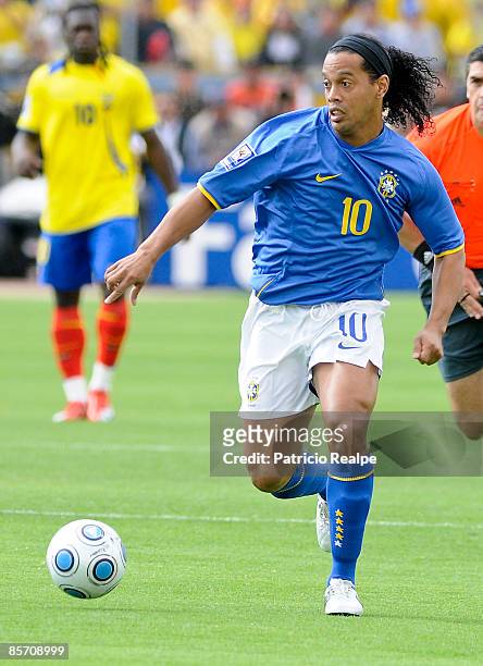 Brazilian player Ronaldinho runs with the ball during their FIFA 2010 World Cup Qualifying match at the Atahualpa Olympic Stadium on March 29, 2009...