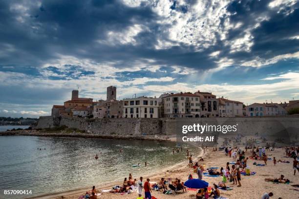 beach of the gravette in antibes, french riviera, france - beach club stock pictures, royalty-free photos & images