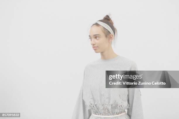 Model poses prior the Moncler Gamme Rouge show as part of the Paris Fashion Week Womenswear Spring/Summer 2018 on October 3, 2017 in Paris, France.