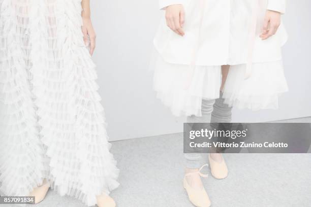 Models pose prior the Moncler Gamme Rouge show as part of the Paris Fashion Week Womenswear Spring/Summer 2018 on October 3, 2017 in Paris, France.