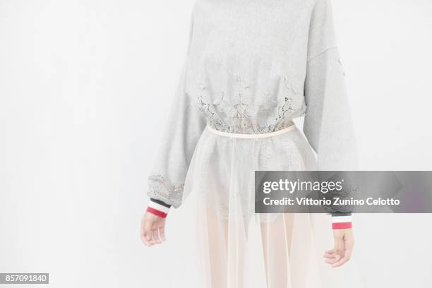 Model poses prior the Moncler Gamme Rouge show as part of the Paris Fashion Week Womenswear Spring/Summer 2018 on October 3, 2017 in Paris, France.