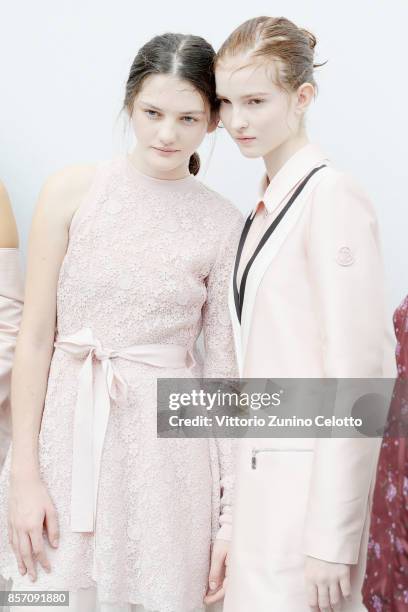 Models pose prior the Moncler Gamme Rouge show as part of the Paris Fashion Week Womenswear Spring/Summer 2018 on October 3, 2017 in Paris, France.