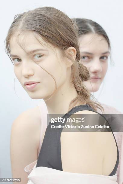 Models pose prior the Moncler Gamme Rouge show as part of the Paris Fashion Week Womenswear Spring/Summer 2018 on October 3, 2017 in Paris, France.