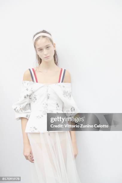 Model poses prior the Moncler Gamme Rouge show as part of the Paris Fashion Week Womenswear Spring/Summer 2018 on October 3, 2017 in Paris, France.