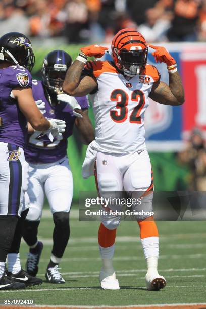 Jeremy Hill of the Cincinnati Bengals celebrates a first down during the game against the Baltimore Ravens at Paul Brown Stadium on September 10,...