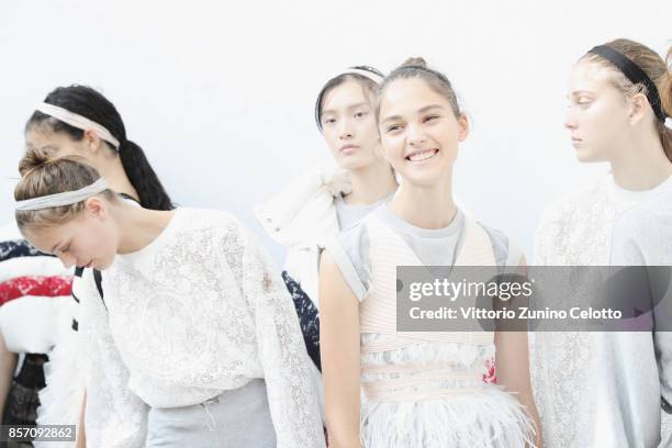 Models pose prior the Moncler Gamme Rouge show as part of the Paris Fashion Week Womenswear Spring/Summer 2018 on October 3, 2017 in Paris, France.