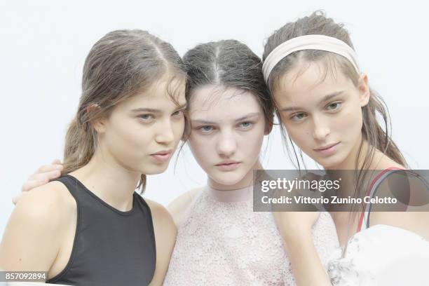 Models pose prior the Moncler Gamme Rouge show as part of the Paris Fashion Week Womenswear Spring/Summer 2018 on October 3, 2017 in Paris, France.