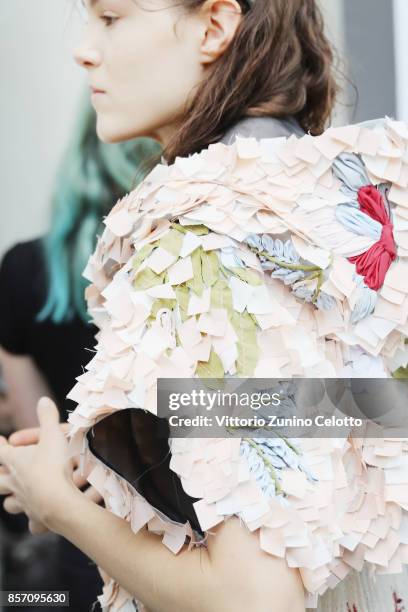 Model poses prior the Moncler Gamme Rouge show as part of the Paris Fashion Week Womenswear Spring/Summer 2018 on October 3, 2017 in Paris, France.