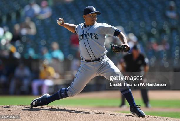 Erasmo Ramirez of the Seattle Mariners pitches against the Oakland Athletics in the bottom of the first inning at Oakland Alameda Coliseum on...