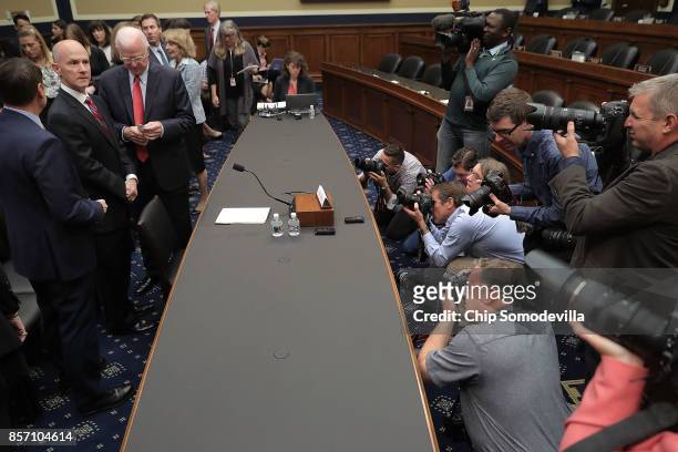 Former Equifax CEO Richard Smith arrives with former Sen. Saxby Chambliss before testifying to the House Energy and Commerce Committee's Digital...