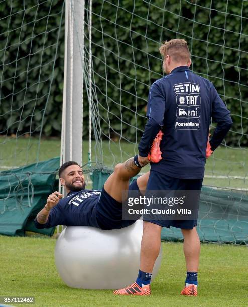 Ciro Immobile and Lorenzo Insigne of Italy in action during a training session at Italy club's training ground at Coverciano on October 3, 2017 in...
