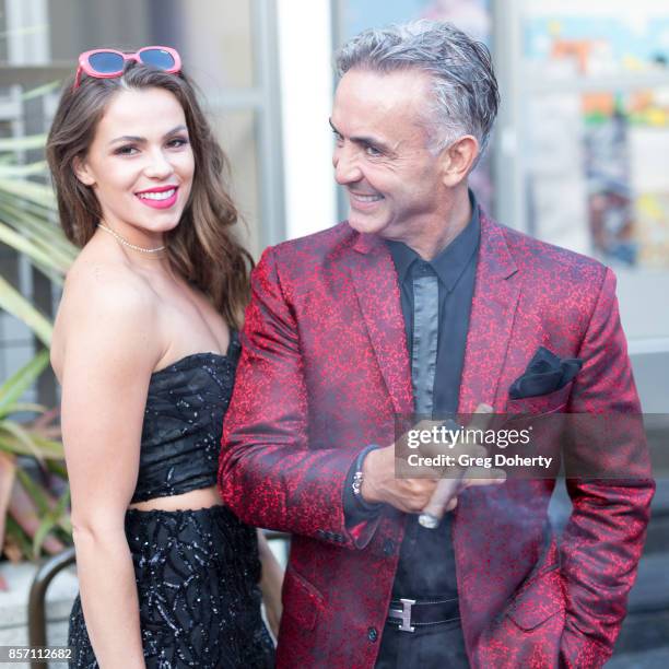 Madison Beckley and Spyro Kemble attend the Premiere Of Bravo's "Real Estate Wars" at Seven-Degrees on October 2, 2017 in Laguna Beach, California.