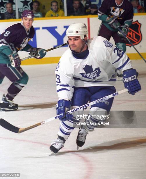 Tie Domi of the Toronto Maple Leafs skates against the Mighty Ducks of Anaheim during NHL game action on November 7, 1995 at Maple Leaf Gardens in...