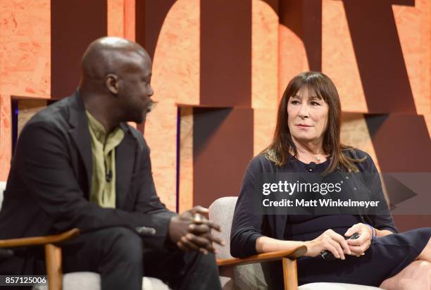 Founder and Principal, Adjaye Associates David Adjaye and actor Anjelica Huston speak onstage during Vanity Fair New Establishment Summit at Wallis...