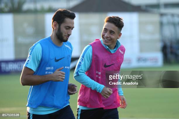 Turkish National Football Team players, Emre Mor and Hakan Calhanoglu exercise during a training session ahead of the FIFA World Cup European...