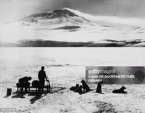 The South Pole expedition by Robert Falcon Scott , the explorers before the Erebus volcano on Ross island, January 15 20th century.
