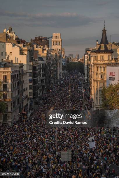 Thousands of citizens gather in Plaza Universitat during a regional general strike to protest against the violence that marred Sunday's referendum...