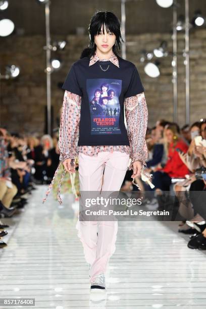 Model walks the runway during the Louis Vuitton Paris show as part of the Paris Fashion Week Womenswear Spring/Summer 2018 on October 3, 2017 in...