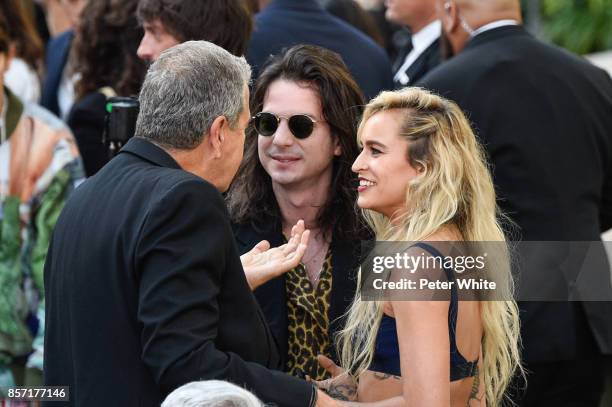 Alice Dellal and guests attend the Chanel Paris show as part of the Paris Fashion Week Womenswear Spring/Summer 2018 on October 3, 2017 in Paris,...